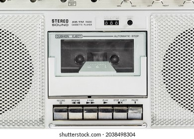 Macro detail of vintage stereo boom box cassette player.