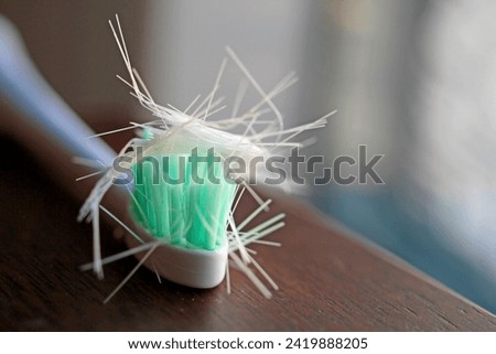 macro of a dissolving  sonic toothbrush