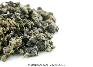 Macro dried tea leaf surface fullframe Tie Guan Yin background