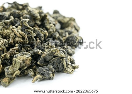 Macro dried tea leaf surface fullframe Tie Guan Yin background