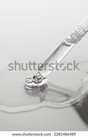 Similar – Image, Stock Photo Transparent cosmetic serum dropper on a blue background
