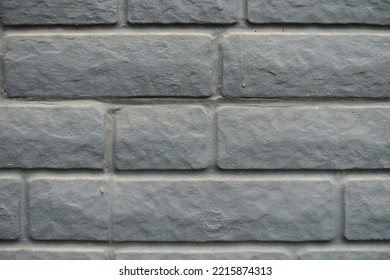 Macro Of Dusty Black Painted Brick Veneer Wall