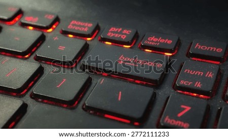 Macro Focus on Backspace Key of a Mechanical Gaming Keyboard with Green Backlight