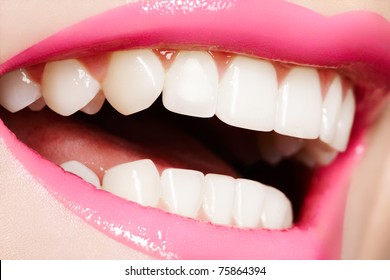 Macro Happy Woman's Smile With Healthy White Teeth, Bright Pink Gloss Lips Make-up. Stomatology And Beauty Care