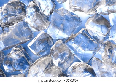 macro of ice cubes in a blue bin