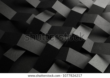 Macro image of black stripes intertwined, three-dimensional effect, abstract background