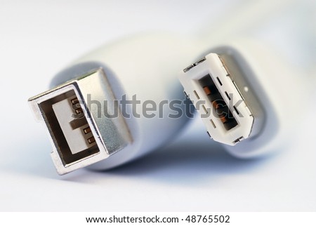 Macro image of firewire cable showing different types of connector