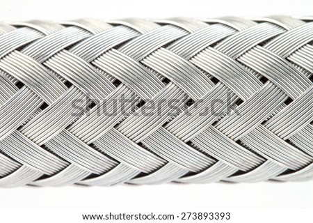 macro image of a metal wire braided reinforced hose