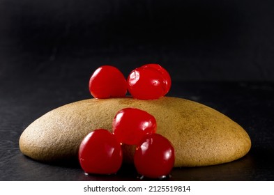 Macro Image Of Molasses Cookie With Red Cherries Horizontal