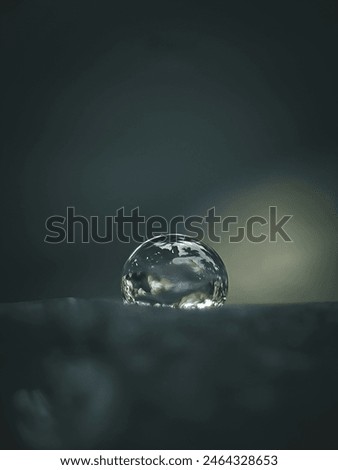 Macro image of a water drop on leaf 