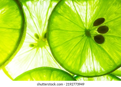 Macro lemon background,Macro Lime,Lemon and green lime overlapped slices close-up background,Macro lemon texture - Shutterstock ID 2192773949