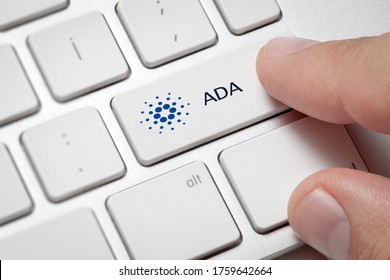 Macro Of Male Hand Pressing Computer Key With Cardano(ADA) Currency Symbol And Text. Cryptocurrency And Fast Internet Concept.