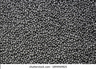 Macro of microbead pearls for cavity wall insulation  