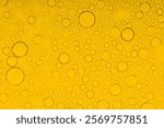 Macro microscope yellow bubble texture, Close-up Yellow bubbles and drops oil background . golden Yellow water bubbles, close up golden oil drop for celebration 