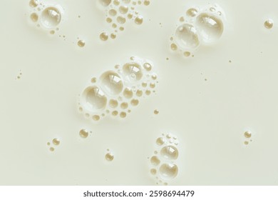 Macro milk texture and bubbles,macro milk texture,White surface of milk and bubbles and ripples from above birds eye view