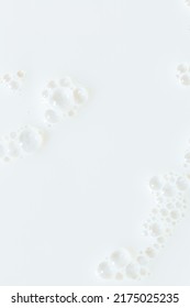 macro milk texture,White surface of milk and bubbles and ripples from above birds eye view