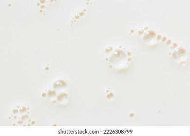 macro milk texture,White surface of milk and bubbles and ripples from above birds eye view