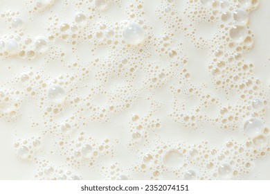 macro milk texture,White surface of milk and bubbles and ripples from above birds eye view