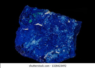 Macro mineral stone Azurite in siltstone against black background close up - Shutterstock ID 1328423492