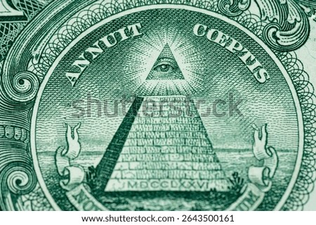 Macro of One US Dollar bill pyramid all seeing eye front side of American currency straight 1