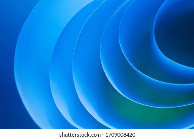Macro photo. Abstract minimalistic background - paper art. Waves, paper cut. Single Frame from sheets of paper illuminated by neon light. Minimalism, copyspace. 3D effect.  - Powered by Shutterstock