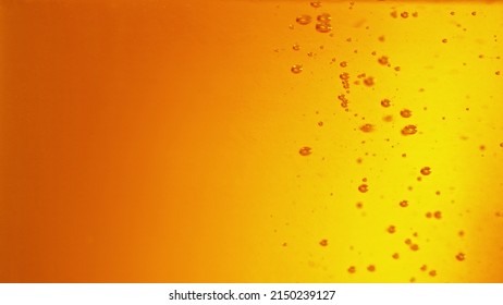 Macro photo of bubbling beer, closeup. Abstract beverages background, fresh look. - Shutterstock ID 2150239127