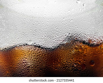 Macro photo of cold water droplets side of iced coffee cup - Powered by Shutterstock