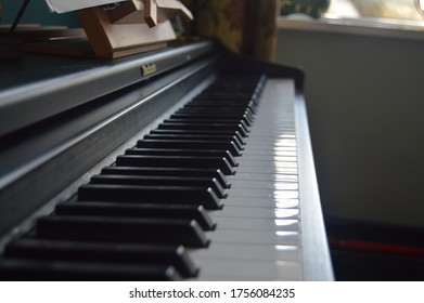 Macro Photo Down Piano Looking Over The Keys.