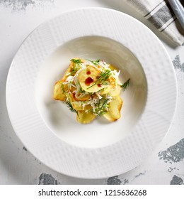 Macro Photo Of Exquisite Serving Salad With Crispy Potato Chips And Chopped Strips Vegetables On Blurred Background. Restaurant Starter Menu Of Veggie Salat With Thin Sliced Fried Potatoes Top View