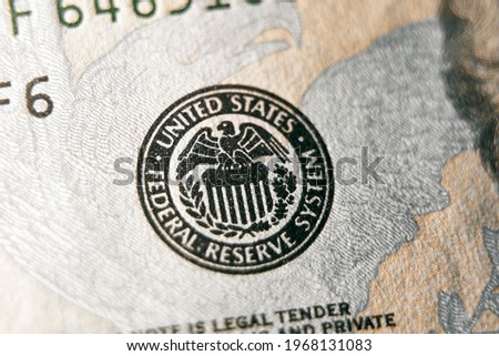 macro photo of federal reserve system symbol on hundred dollar bill. shallow focus. close-up with fine and sharp texture Imagine de stoc © 