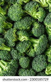 Macro photo green fresh vegetable broccoli. Fresh green broccoli on a black stone table.Broccoli vegetable is full of vitamin.Vegetables for diet and healthy eating.Organic food. - Shutterstock ID 2300185729