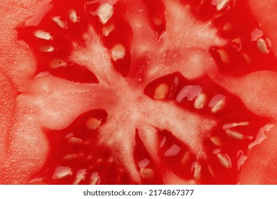 Macro Photo Of Half Cut Tomato Slice With Seeds. Tomato Slice Texture. 