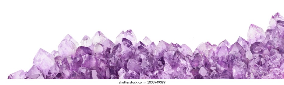 macro photo of lilac amethyst crystals isolated on white background