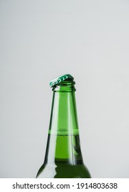 Macro Photo Of The Neck Of An Open Beer Bottle