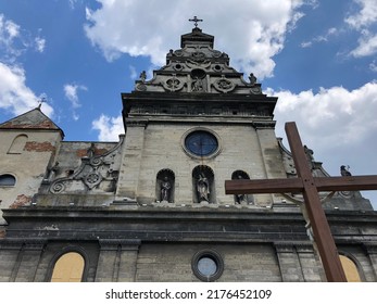 Macro photo old Lviv Catholic church. Stock photo old Ukrainian church building with cross - Shutterstock ID 2176452109