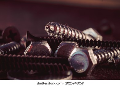 Macro photo of screws. Set of screws. Construction abstraction. Industrial background. Screws macro photo, screw background, steel screw, screw macro.