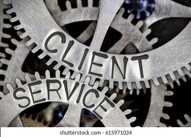 Macro Photo Of Tooth Wheel Mechanism With CLIENT SERVICE Letters Imprinted On Metal Surface