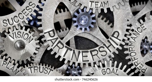Macro photo of tooth wheel mechanism with Partnership related words imprinted on metal surface - Shutterstock ID 746240626