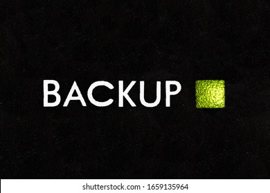 Macro photograph of computer data backup indicator light. 