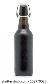 Macro Photography Of A Black Beer On White Background