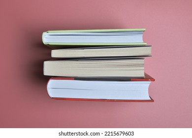 Macro Photography Of Books On Pink Background