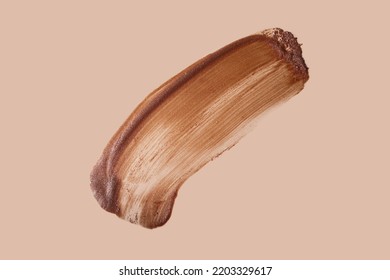 Macro Photography Of The Cosmetic Abstract Highlighter Smear On Beige Background.