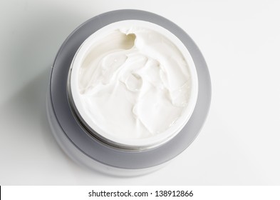 macro photography face cream on white background