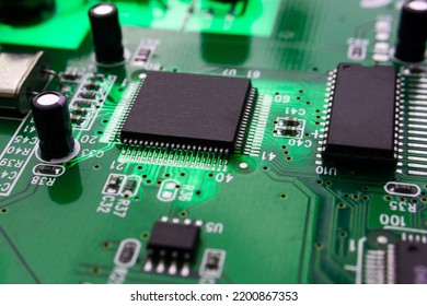 Macro Photography Of Integrated Modern Circuit On Printed Circuit Board.