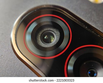 Macro Photography Of Mobile Phone Camera. Mini Lens And Blitz.