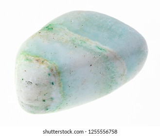 macro photography of natural mineral from geological collection - polished green aragonite gem stone on white background - Shutterstock ID 1255556758