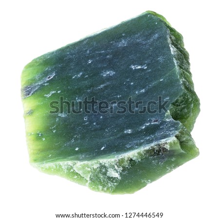 macro photography of natural mineral from geological collection - piece of green Nephrite (jade ) stone on white background