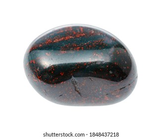 macro photography of sample of natural mineral from geological collection - rolled Heliotrope (Bloodstone) gemstone isolated on white background