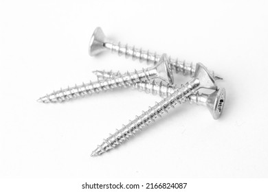 Macro Photography Of Screws On White Background