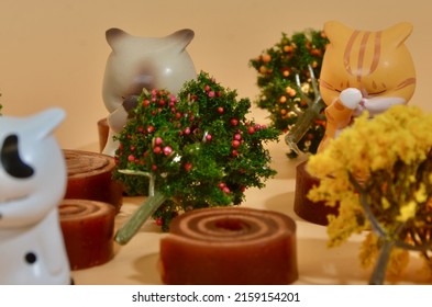 A Macro Photography Of Small Figurines And Objects